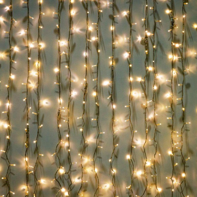 Guirlande Lumineuse 15M 192LED IP44, 8 modes + timer, Câble vert - Blanc Chaud (piles non incluses) - Silamp France
